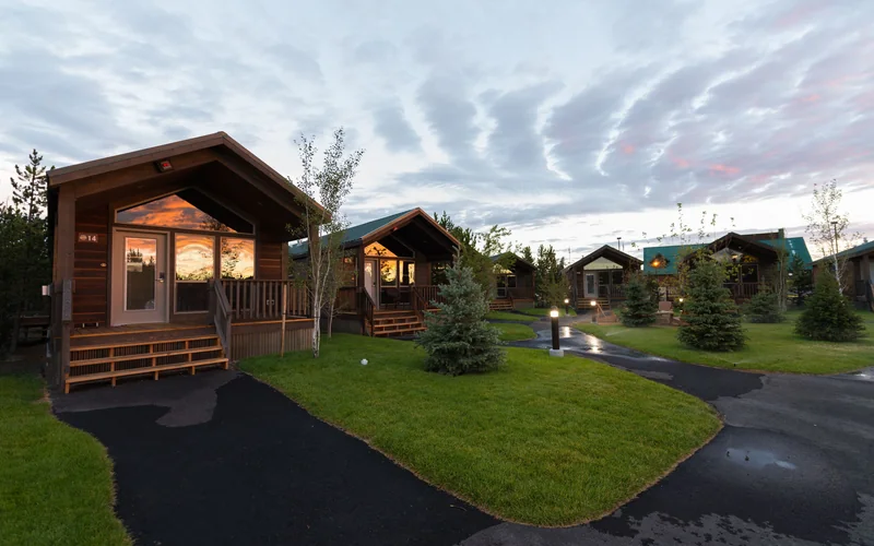 Log cabins and walkway at Explorer Cabins at Yellowstone